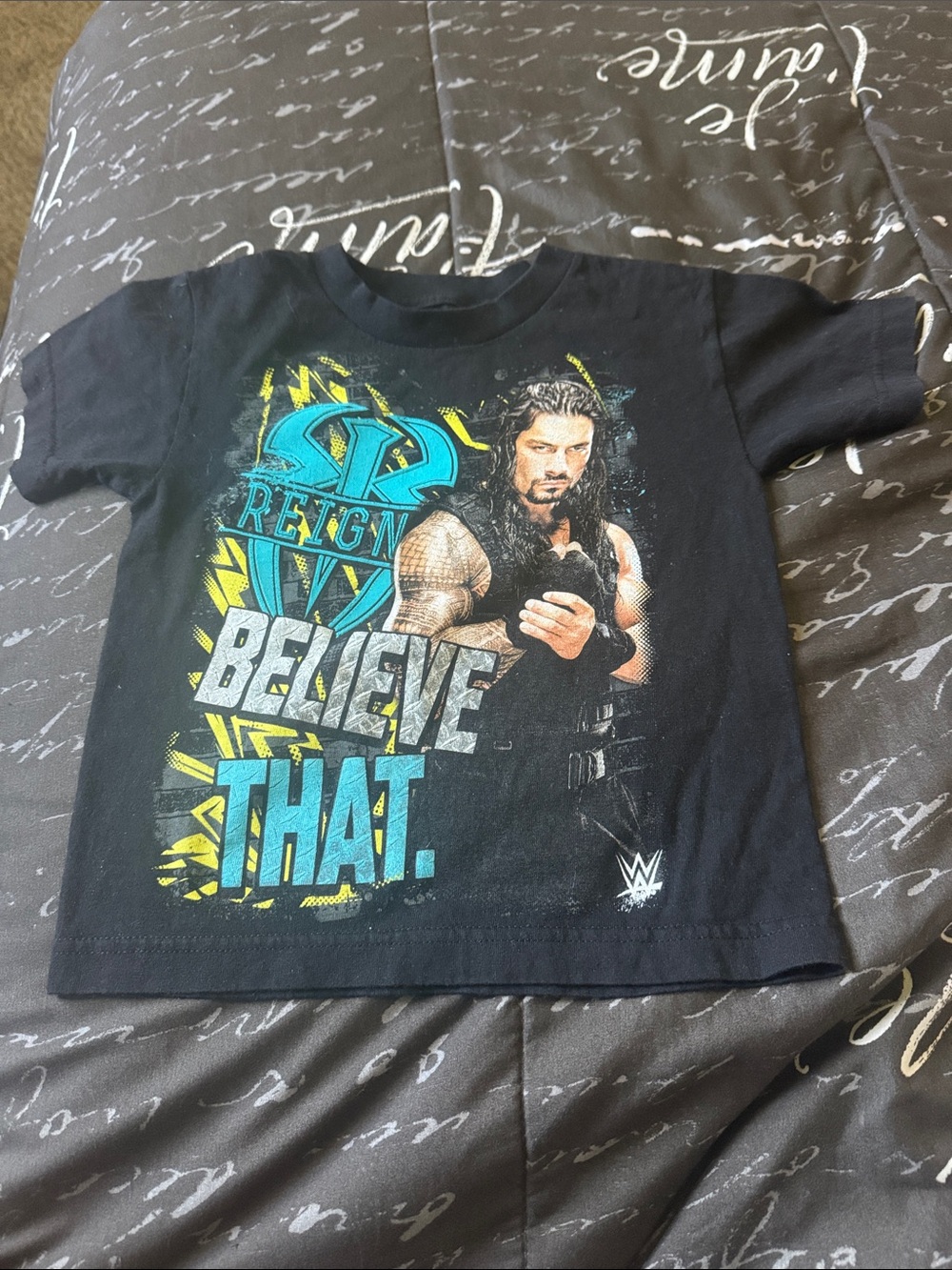 WWE Black Kids Roman Reigns "Believe That" Graphic Tee with Teal & Yellow Print